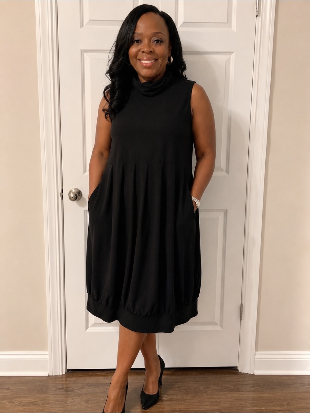 Tiana B. Sleeveless Black Turtleneck Bubble Hem Dress